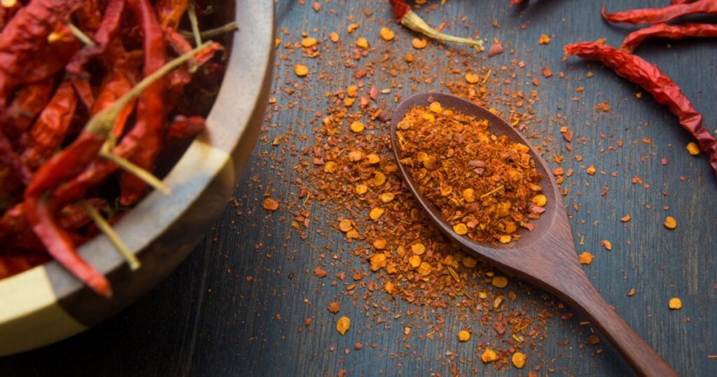 Cayenne pepper on the wooden floor