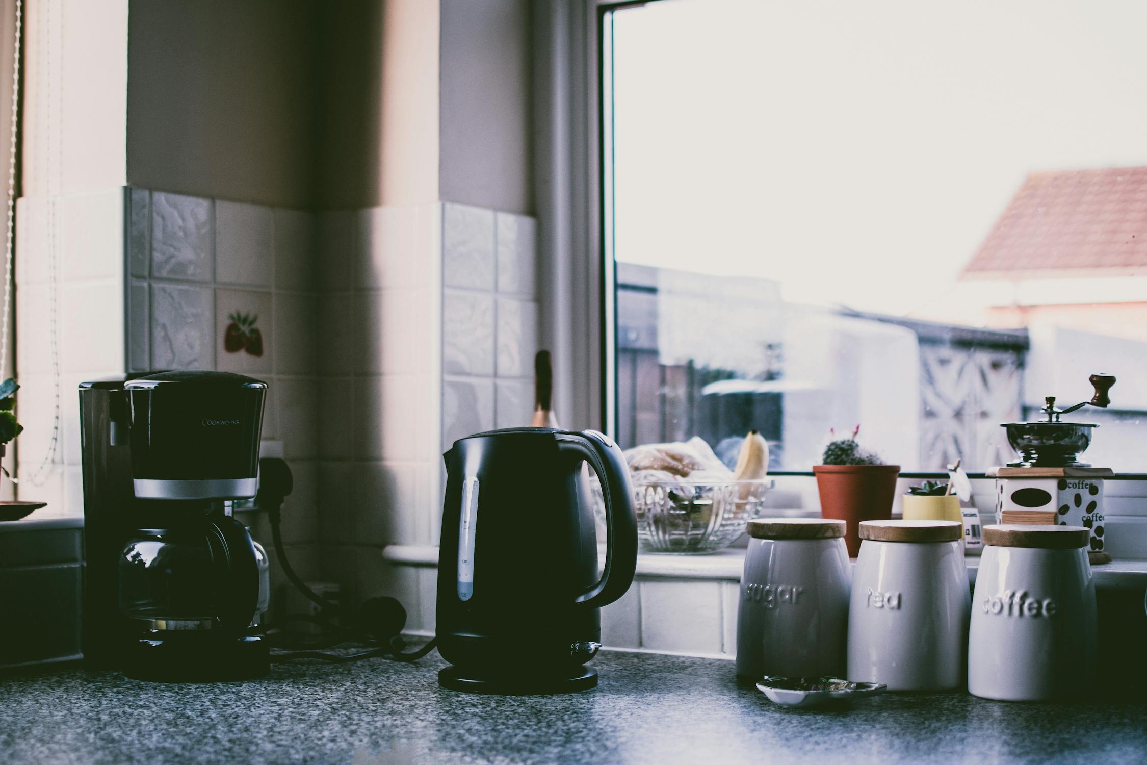 Photograph of a Kitchen Counter with Coffee Maker and Kettle