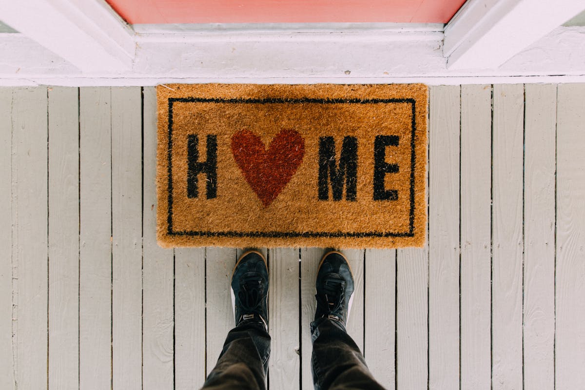 Welcome mat in front of door